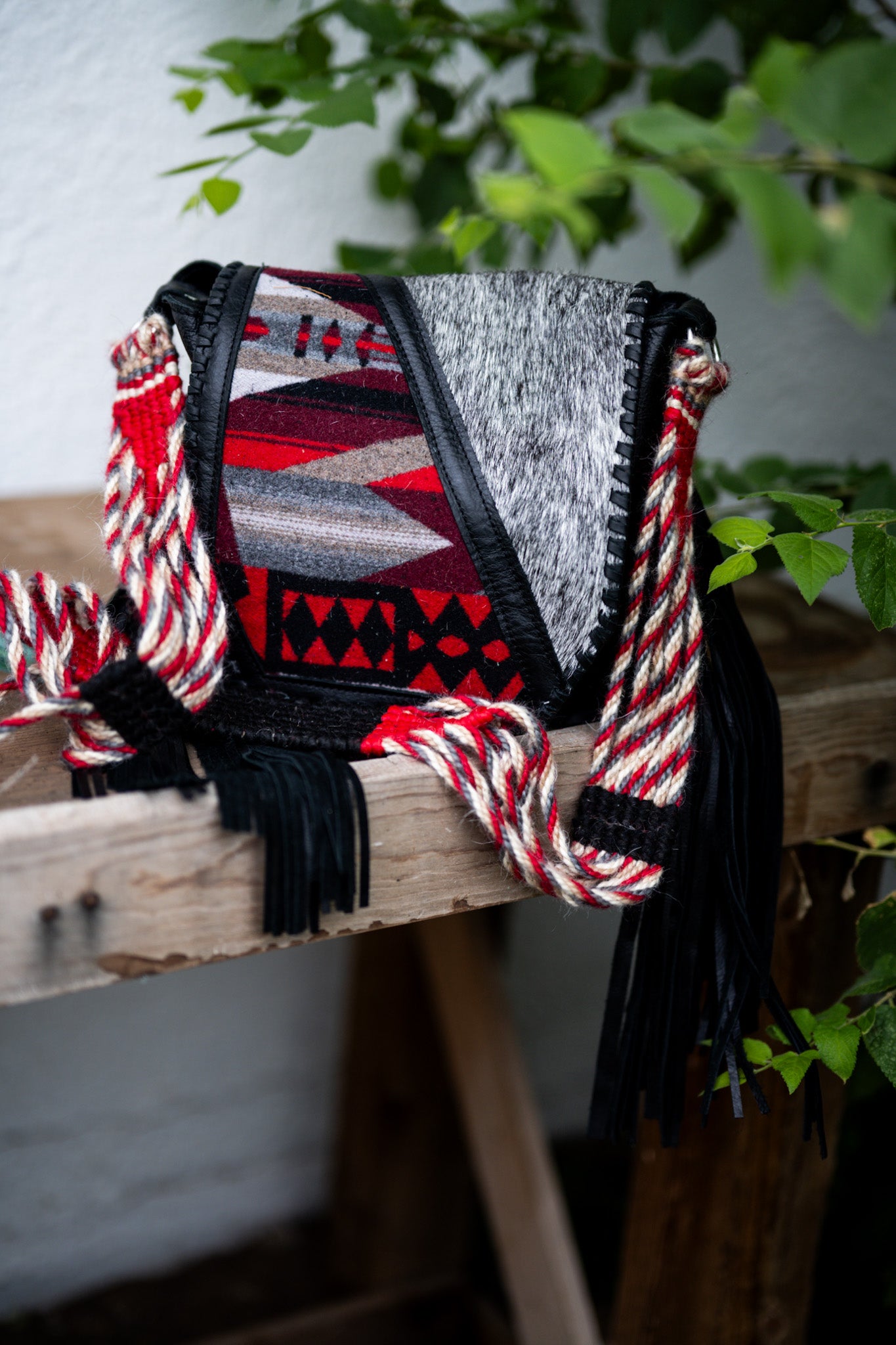Cinch strap flap bag