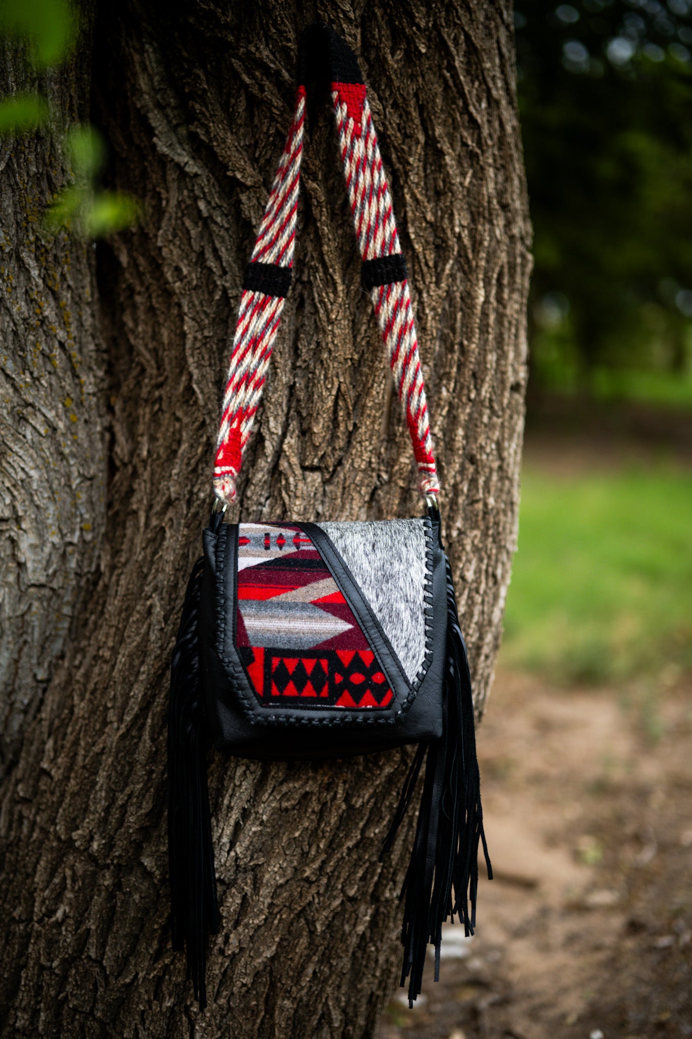 Cinch strap flap bag