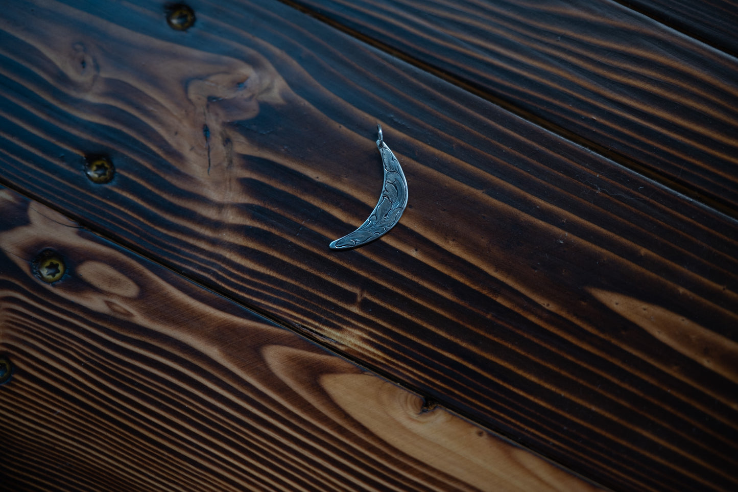 Crescent pendant